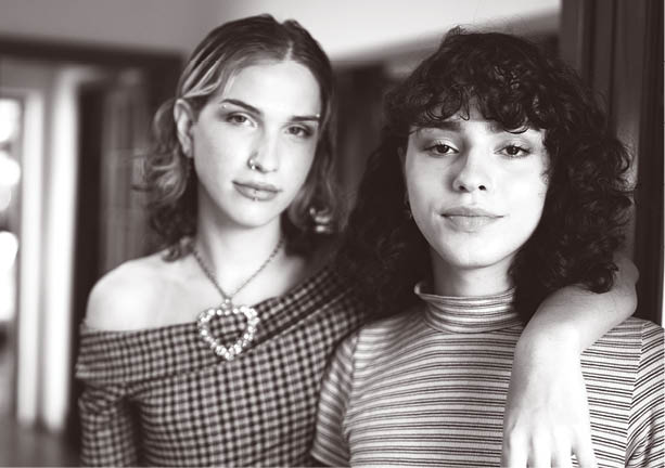 Portrait of a female transgender couple at home